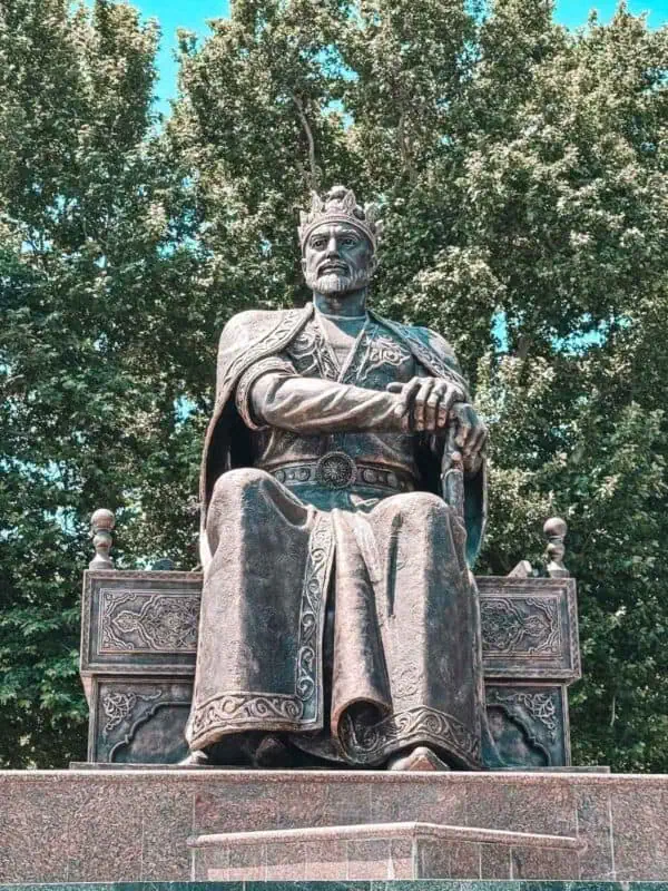 amir timur statue in samarkand surrounded by trees