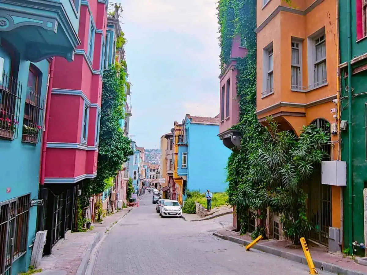 street lined with vibrant and charming houses in fener & balat neighborhood of fatih district in istanbul that's known to be one of the best areas to stay in istanbul with family