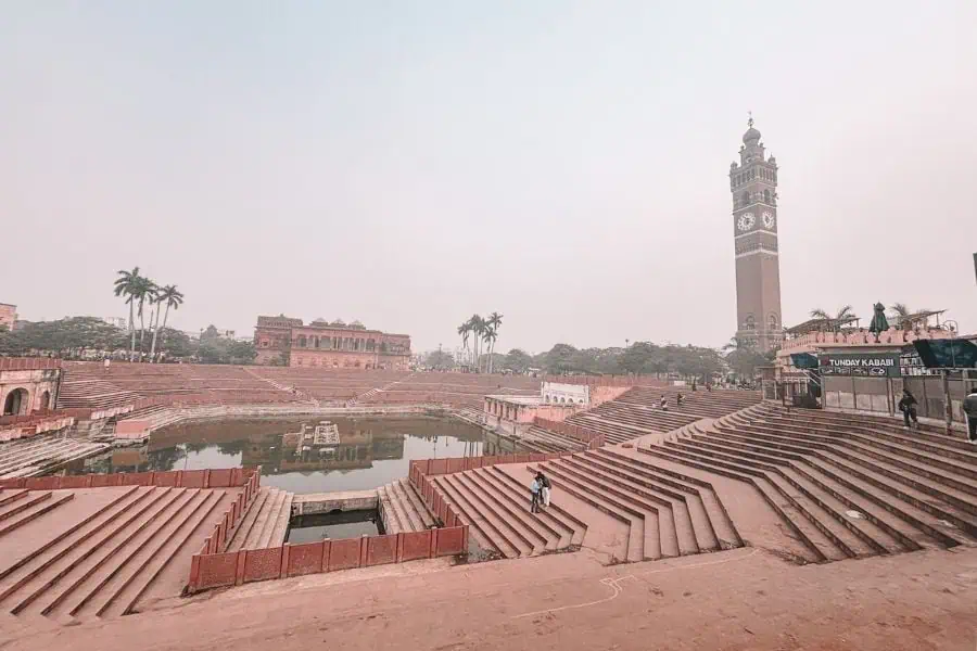 hussainabad clock tower overlooking the stepped tank and surrounding plaza, lucknow