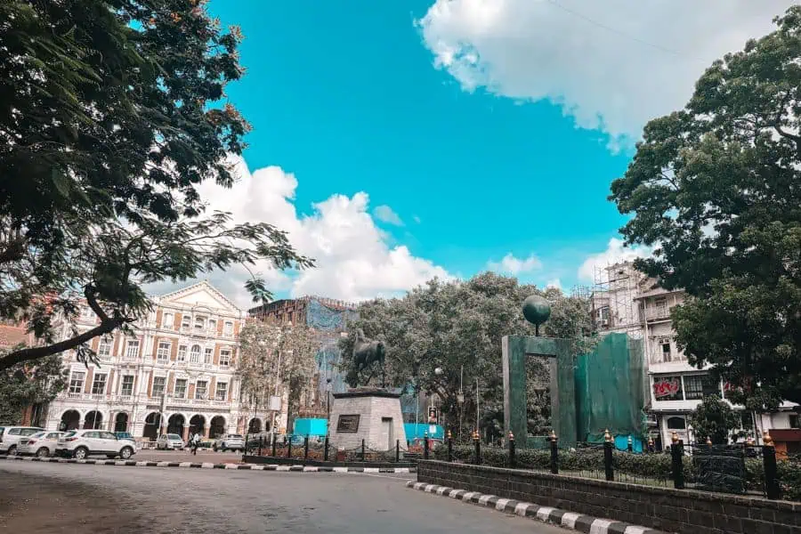 The Kala Ghoda (black horse) statue at the heart of the Kala Ghoda art district in Fort, South Mumbai, with the Army & Navy Building visible behind it