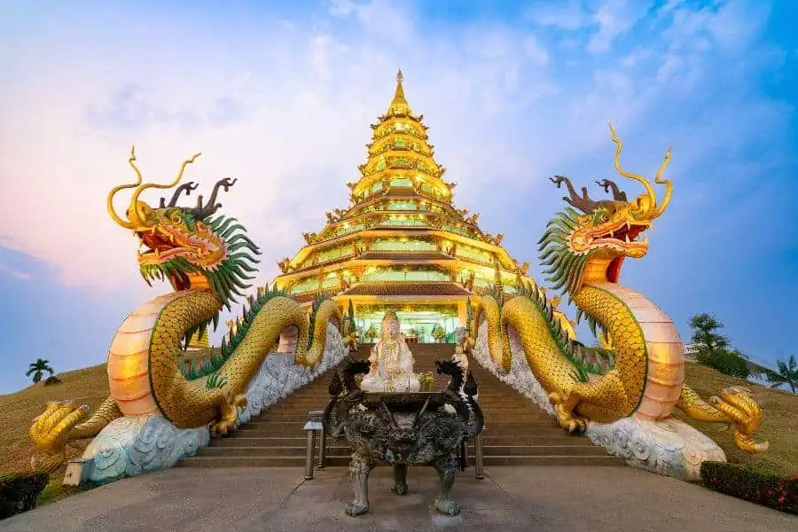 sunset at phop chok dhamma chedi chinese pagoda at wat huay pla kang in chiang rai