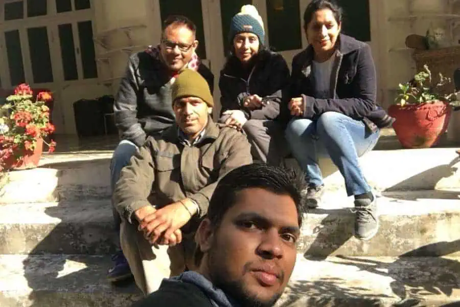 posing with friends at jyoti niwas homestay palampur