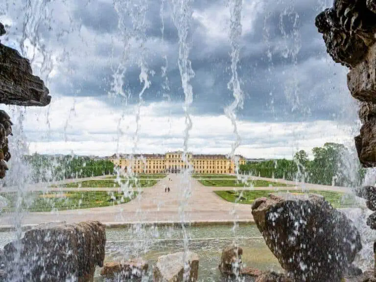schonbrunn palace as seen through the neptune fountain