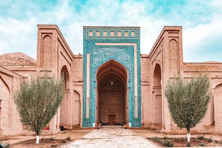sultan saodat complex in termez with turquoise tiled iwan and brick courtyards, islamic necropolis near the afghan border