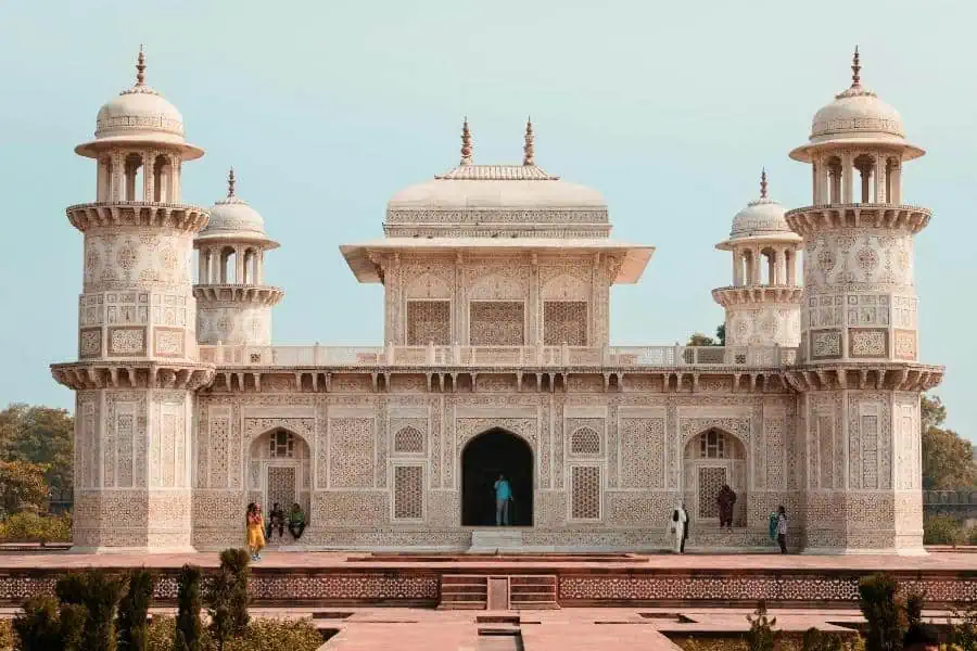 itmad ud daulah tomb aka baby taj in agra with white marble facade and visitors