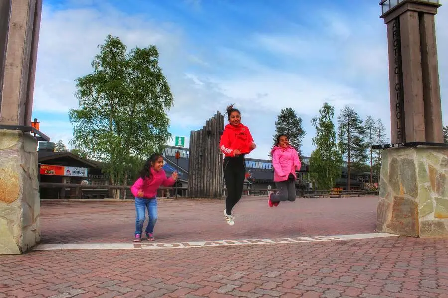 lapland with kids crossing arctic circle rovaniemi
