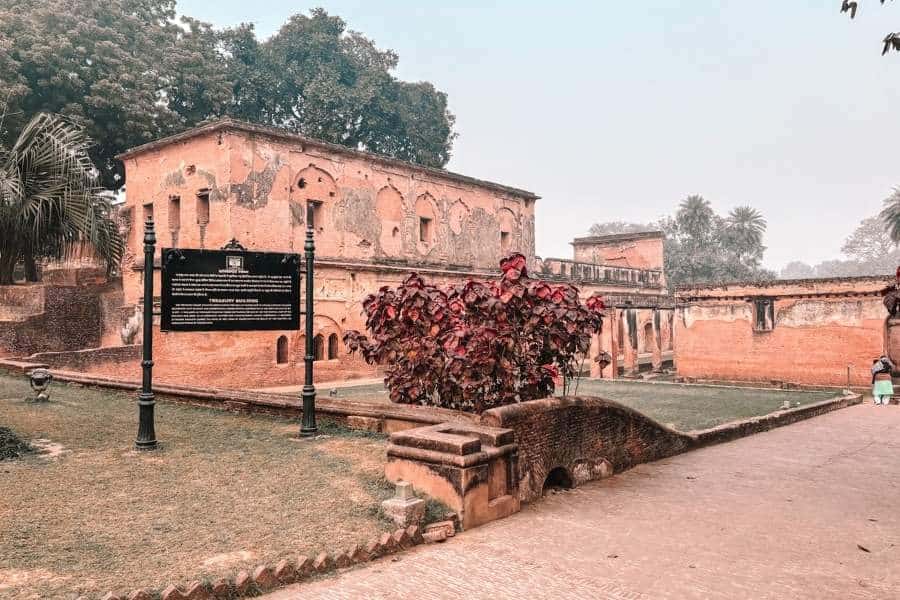 treasury building ruins at the residency with brick walls and garden paths, lucknow